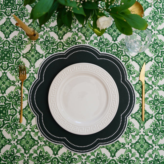 Nurture Green Round Vegan Leather Placemat – crafted with cruelty-free materials, this elegant placemat features refined embroidery and a luxurious, easy-to-clean surface.