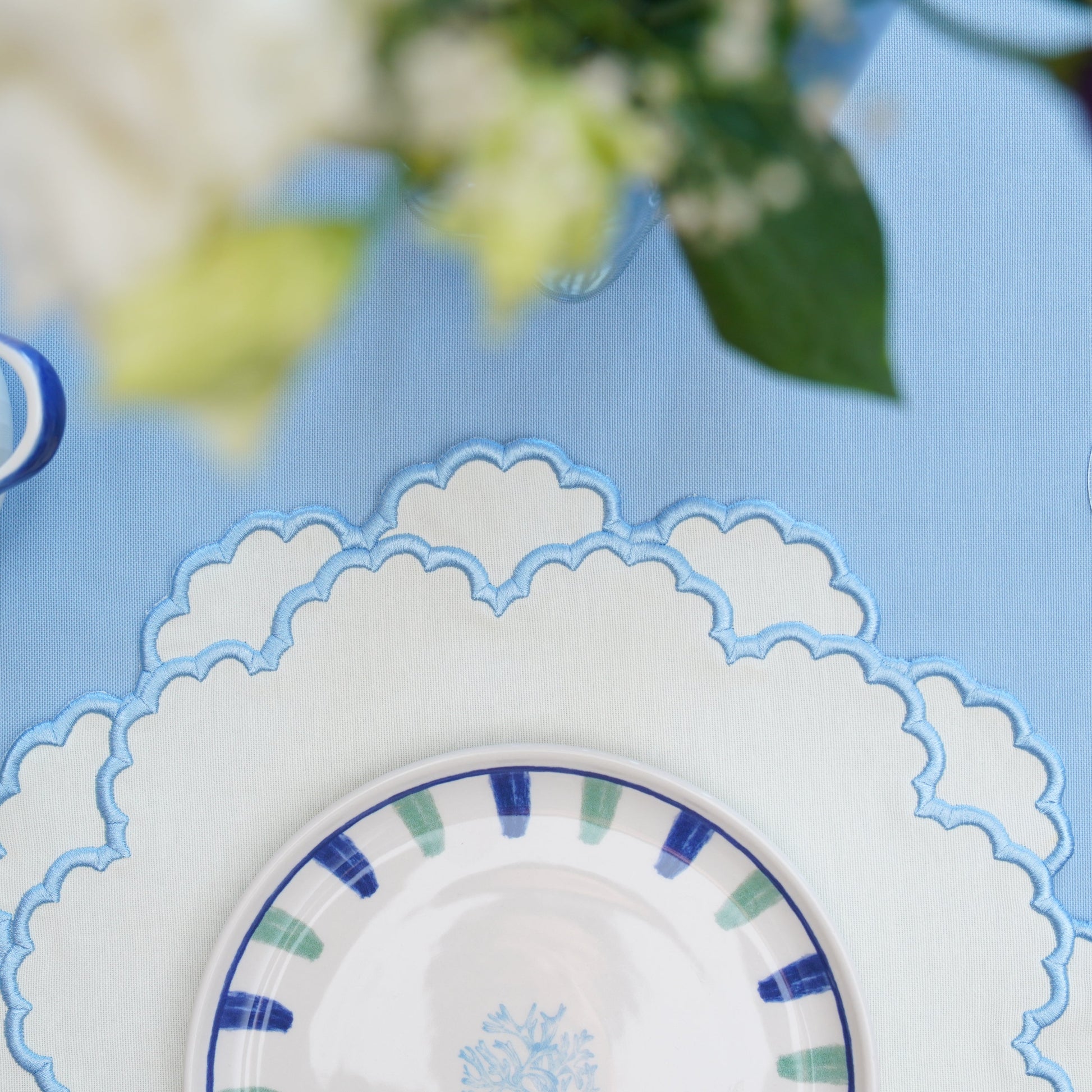 Cressida Collection placemat shown in a sophisticated dining setup