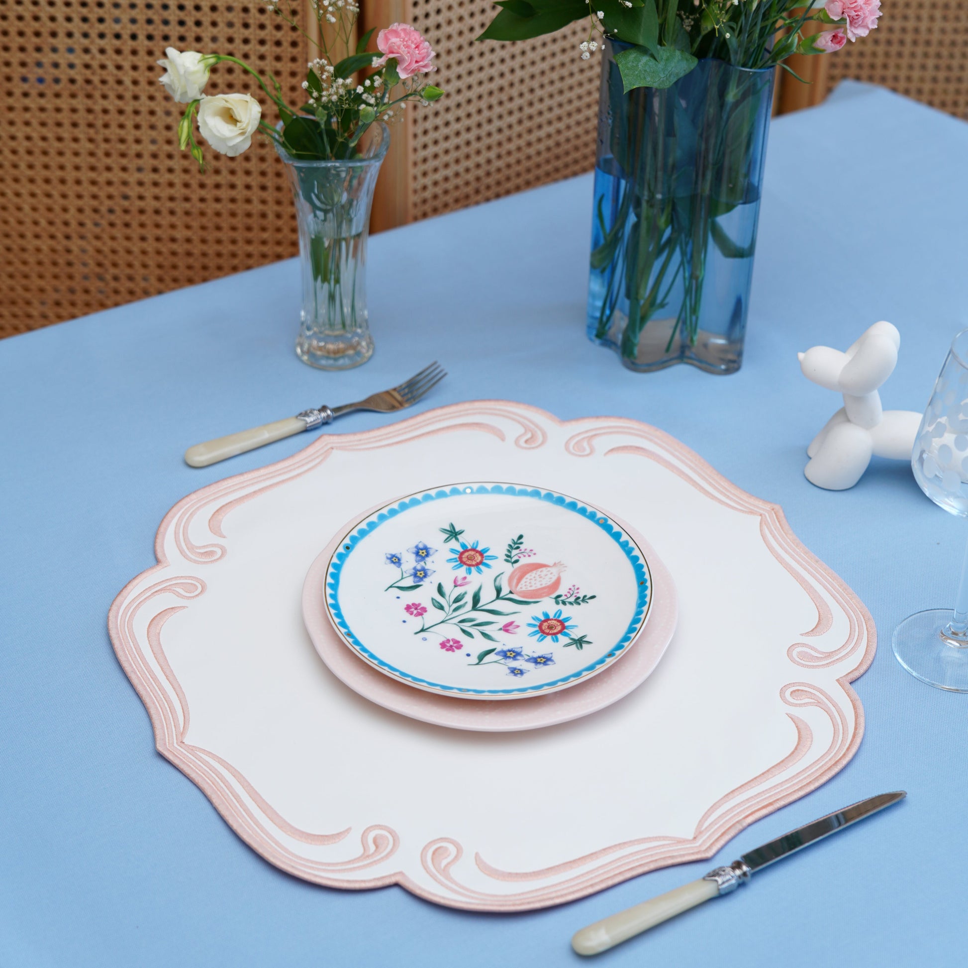 Modern square placemat with soft-edged trim, perfect for event styling