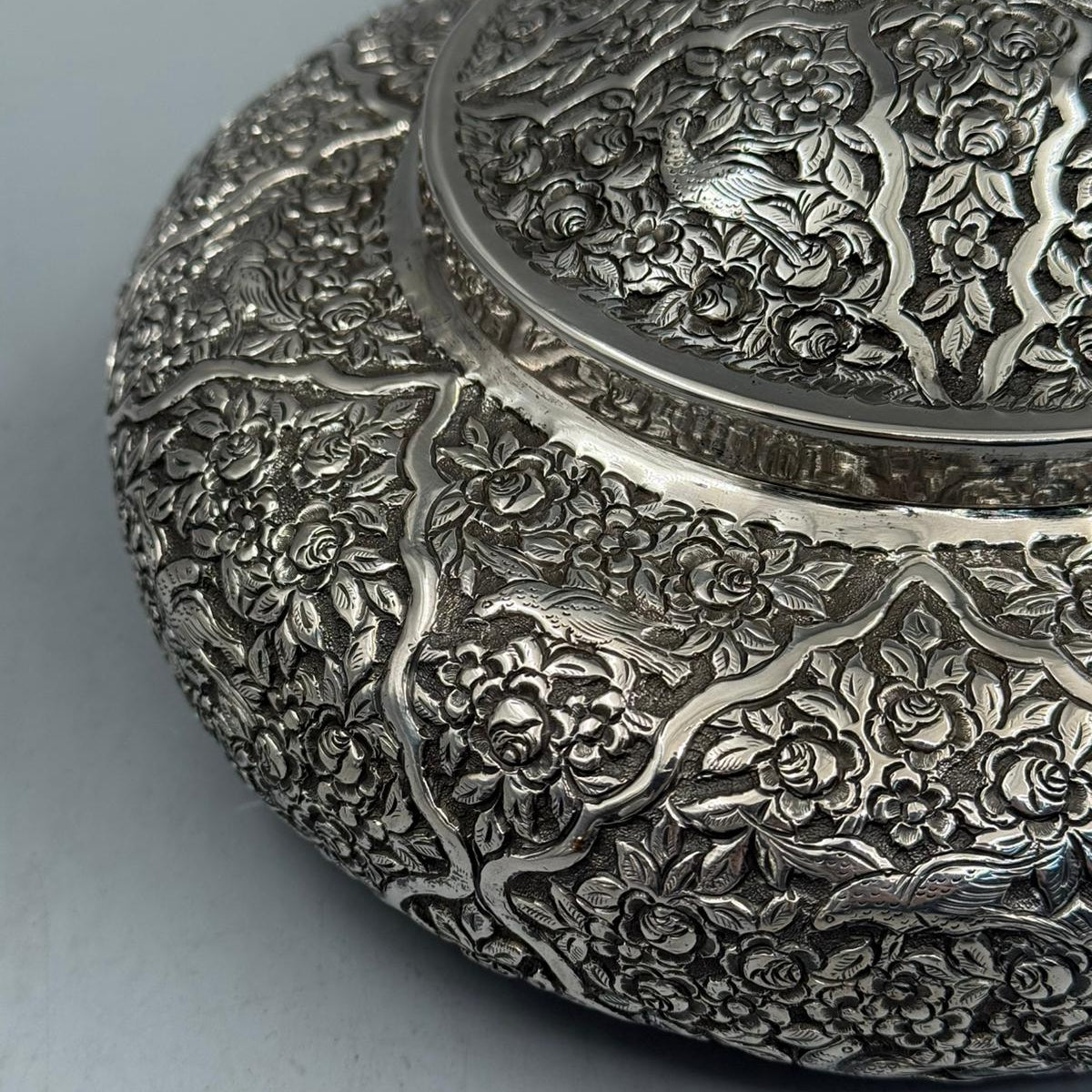 Interior view of the 864g solid silver bonbonniere with the lid placed aside, showing the polished silver interior.