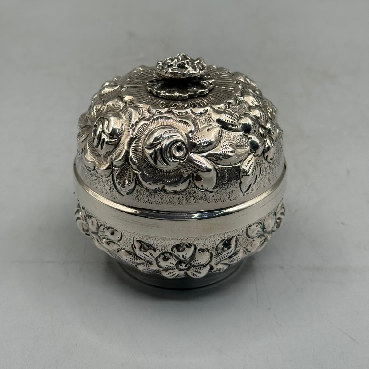 Front view of a 166g solid silver petite candy dish featuring high-relief embossed roses and a detailed rose bud finial.