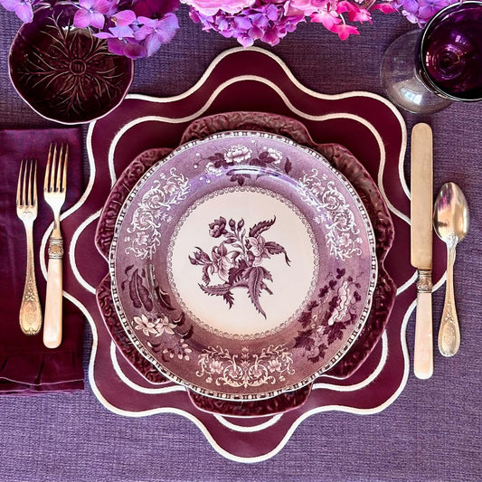 Haven Burgundy Wavy Edge Faux Leather Placemat – detailed shot highlighting the stain-resistant, handcrafted quality and layered construction of the faux leather surface.
