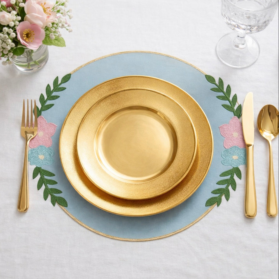 Jasmine light blue round faux leather placemat with a smooth finish for modern table settings, Ship From USA, by Pnr Decor.