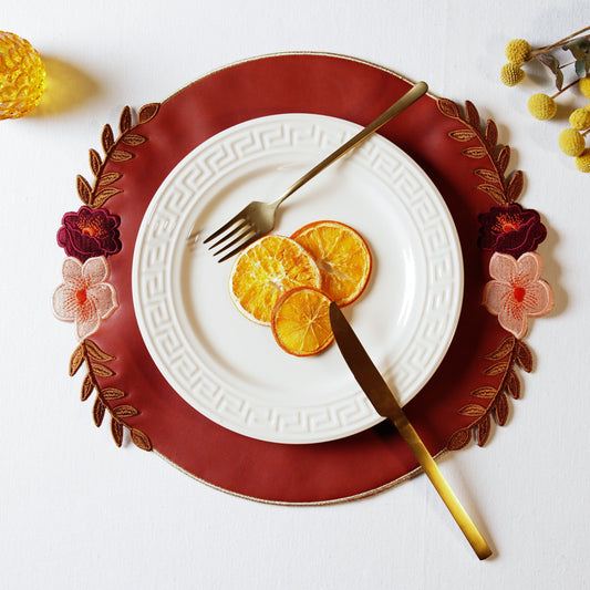 Jasmine Dark Orange Faux Leather Placemat – expertly handcrafted from eco-friendly, vegan faux leather with elegant embroidery and double-layered design, stain-resistant and durable. Exclusively by PNR Decor.