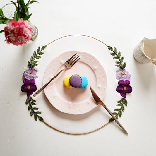 Jasmine White Round Faux Leather Placemat (Gold Flowers) – expertly handcrafted from eco-friendly, vegan faux leather with elegant embroidery and double-layered design, stain-resistant and durable. Exclusively by PNR Decor.