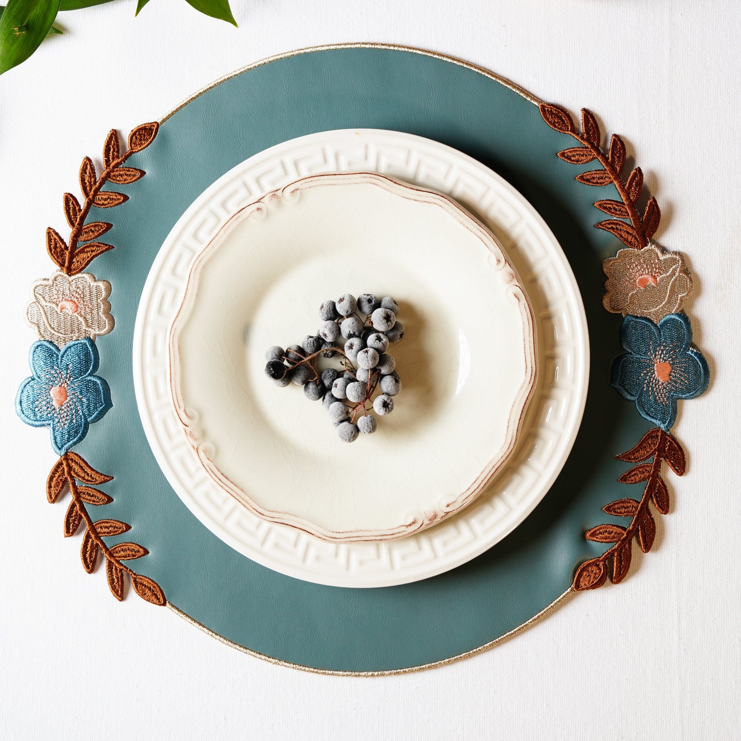 Jasmine blue faux leather round placemat styled for a winter holiday table setting by PNRDECOR ship from USA
