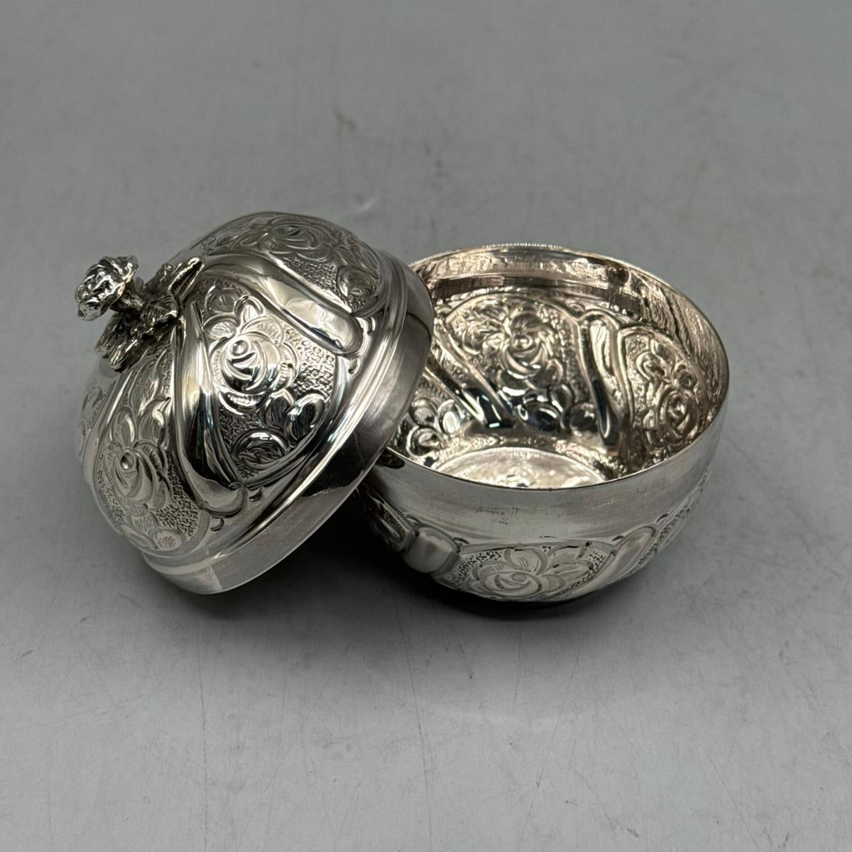 Side perspective of the 6cm diameter silver rose bonbonniere, a premium statement piece for luxury home decor and collectors.
