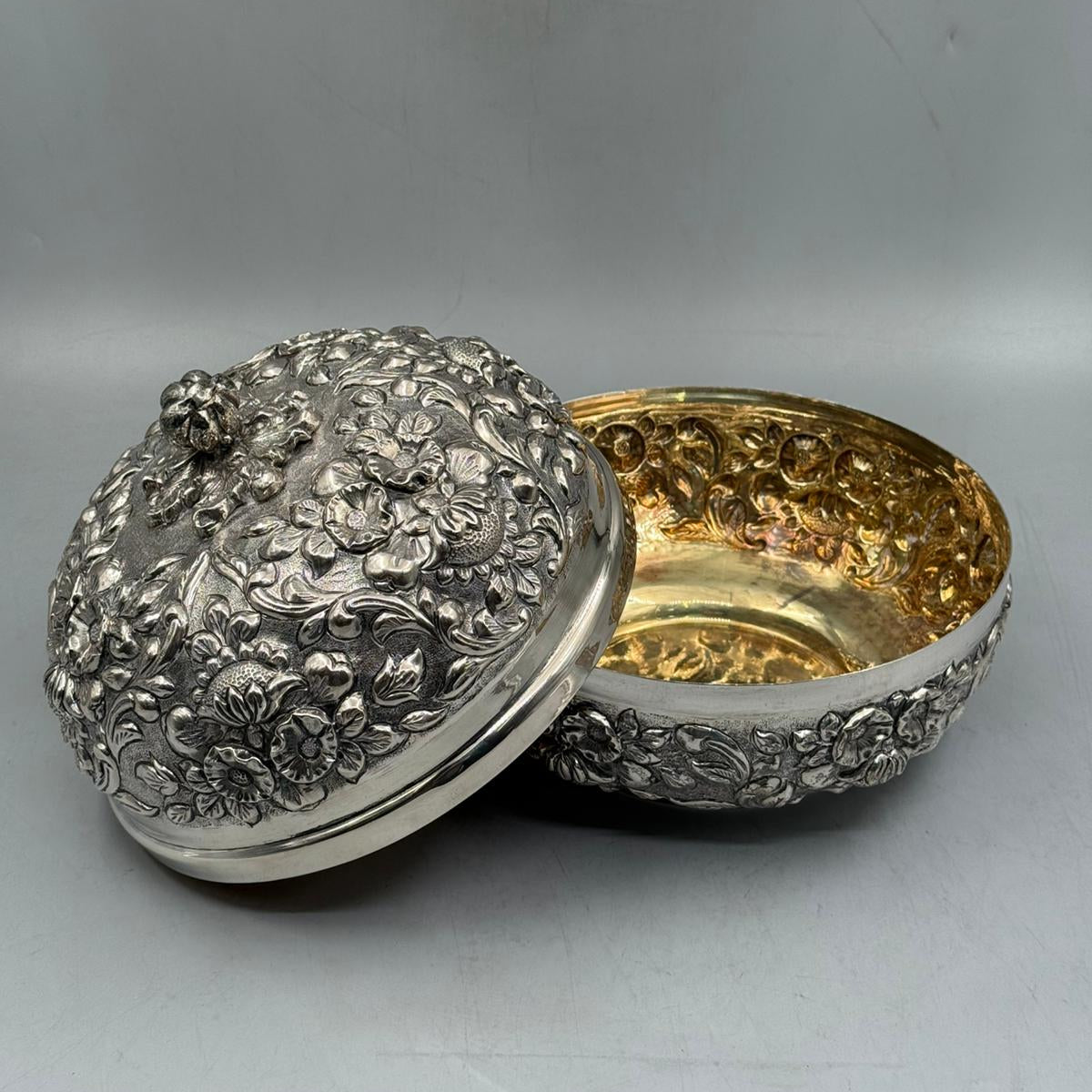 Side perspective of the large 23cm diameter silver bonbonniere, a premium statement piece for high-end home decor.