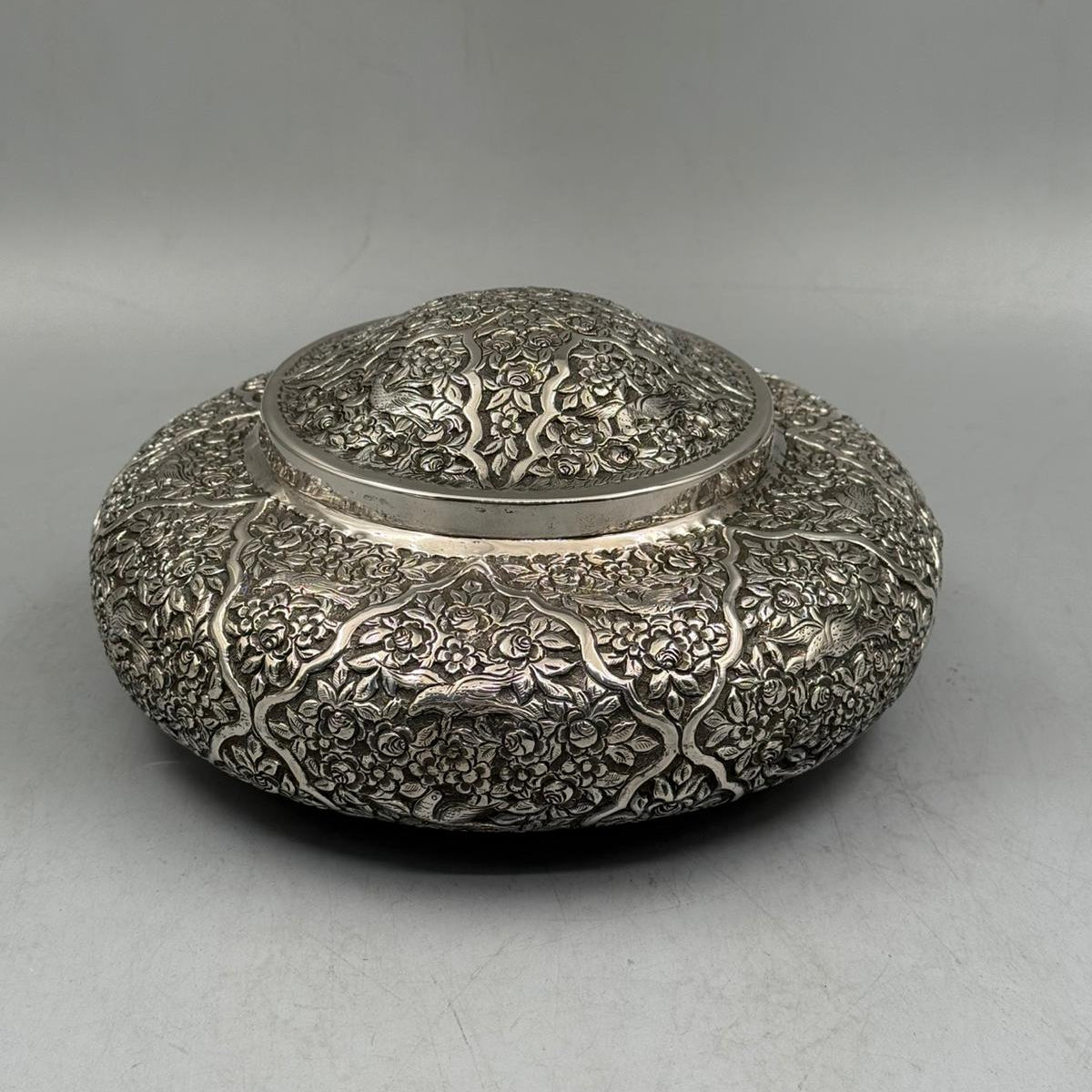 Side profile of the 23cm diameter oxidized silver bonbonniere, showcasing the elegant domed lid and craftsmanship.