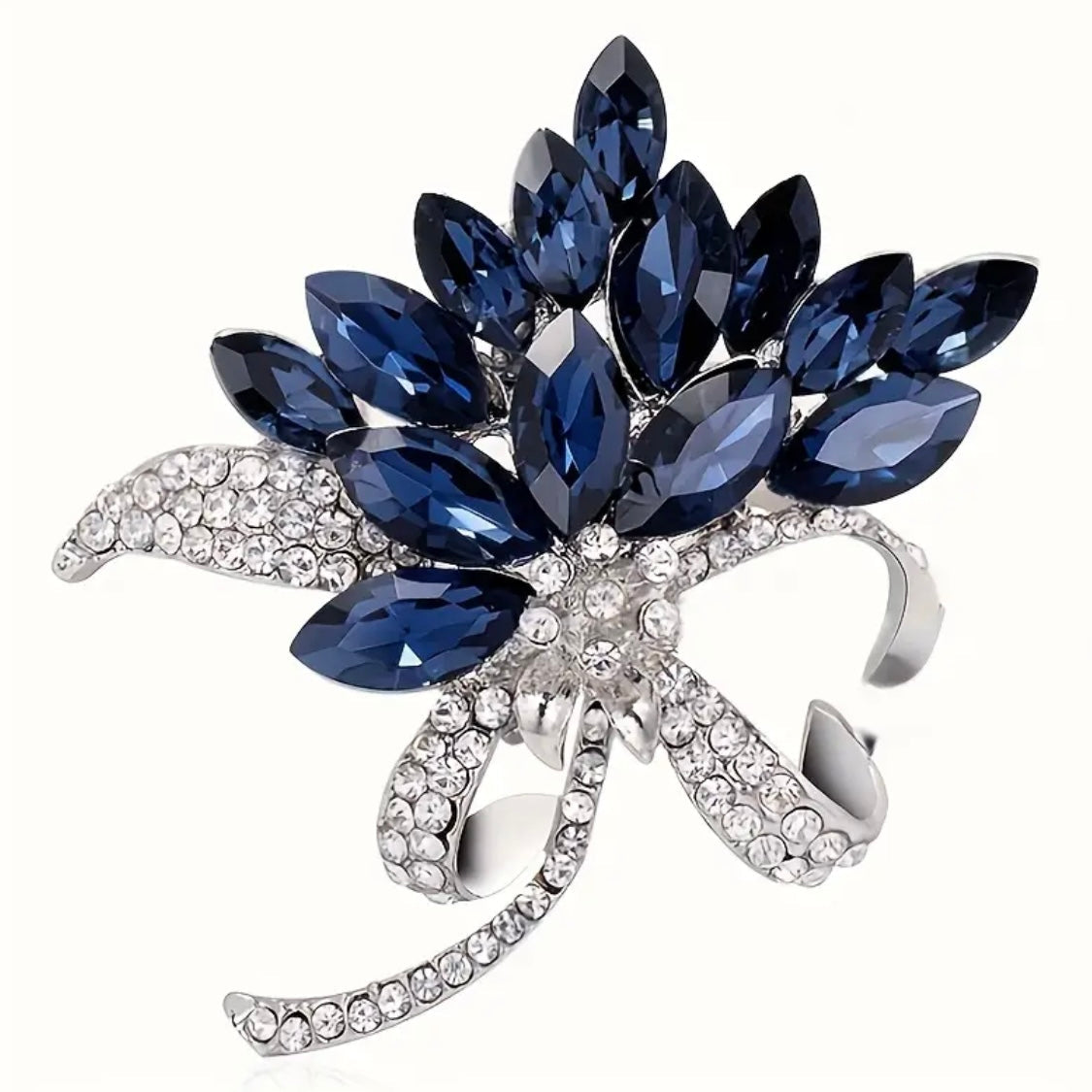 Close-up of the Midnight Bloom brooch showing blue crystal facets and shimmering stone detail, Ship From USA, by Pnr Decor.
