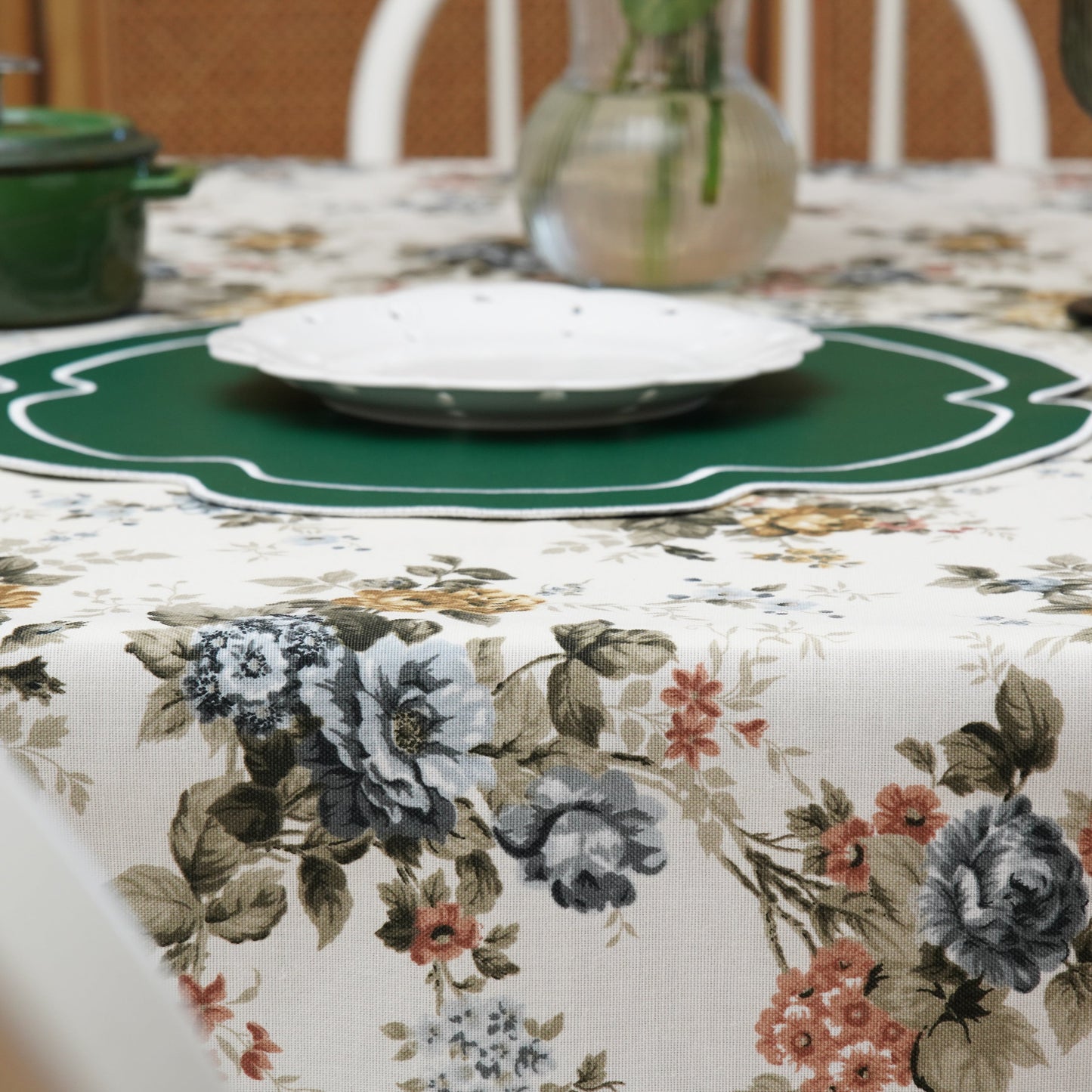 Faux leather round placemat featured in a modern flatlay layout