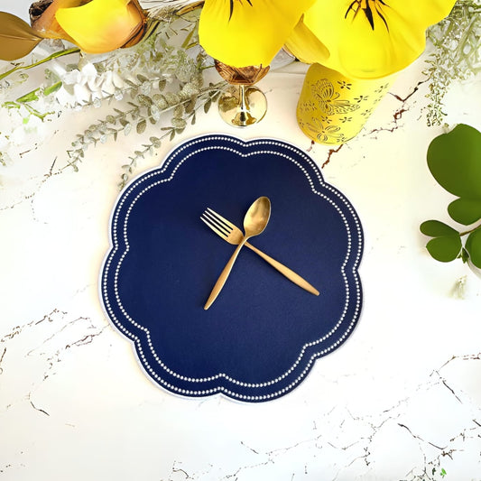 Nurture Blue Round Faux Leather Placemat – expertly handcrafted from eco-friendly, vegan faux leather with elegant embroidery and double-layered design, stain-resistant and durable. Exclusively by PNR Decor.