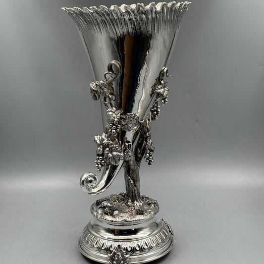 Close up of the intricate grapevine and rustic base of the silver vase by PNR Decor ship from USA