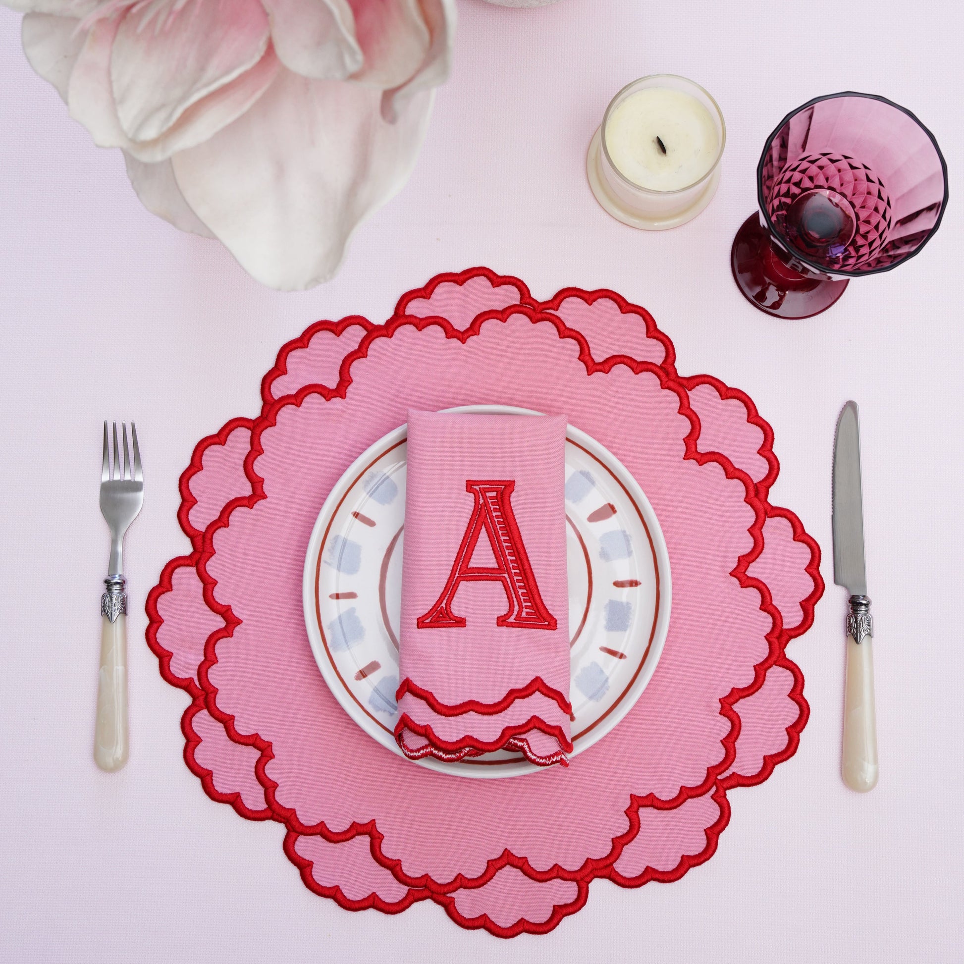 Elegant placemat and napkin set designed with delicate embroidery for formal tables