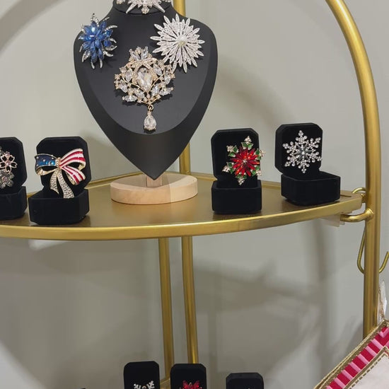 Golden crystal starburst brooch styled on a blazer or coat for an elegant statement look, Ship From USA, by Pnr Decor.