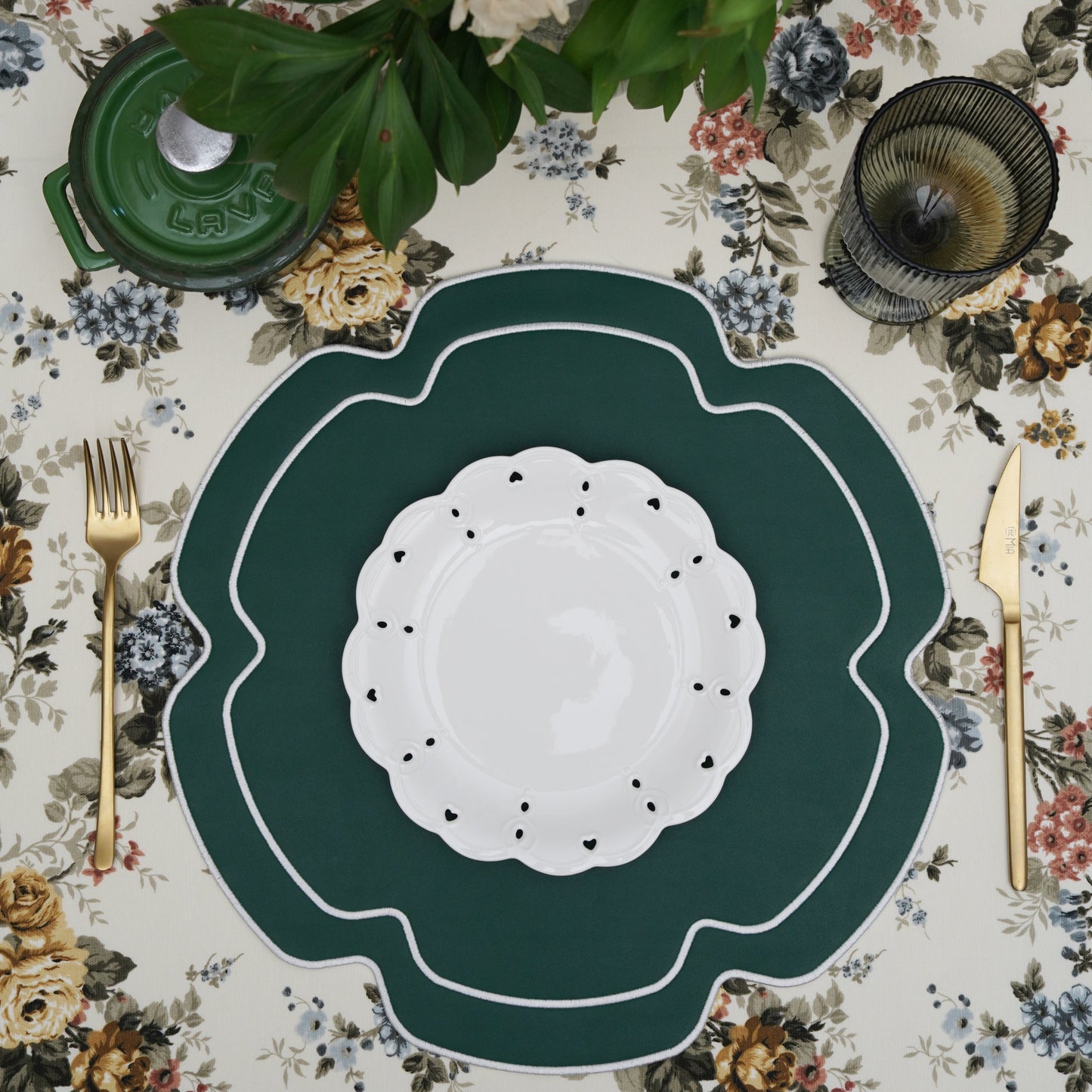 Round faux leather placemat styled for a refined dining setup