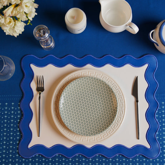 Savor Blue Rectangle Faux Leather Placemat  – expertly handcrafted from eco-friendly, vegan faux leather with elegant embroidery and double-layered design, stain-resistant and durable. Exclusively by PNR Decor.