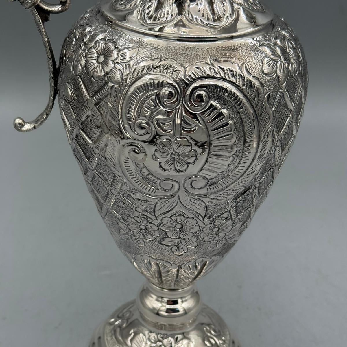 Close up of elegant S-scroll handle and wide spout on silver jug by PNR Decor ship from USA