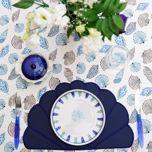 Handcrafted scalloped placemat made from vegan leather with refined stitched edges