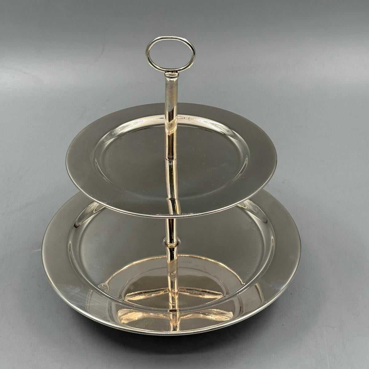 Elegant silver two level dessert stand with polished finish for pastries and snacks