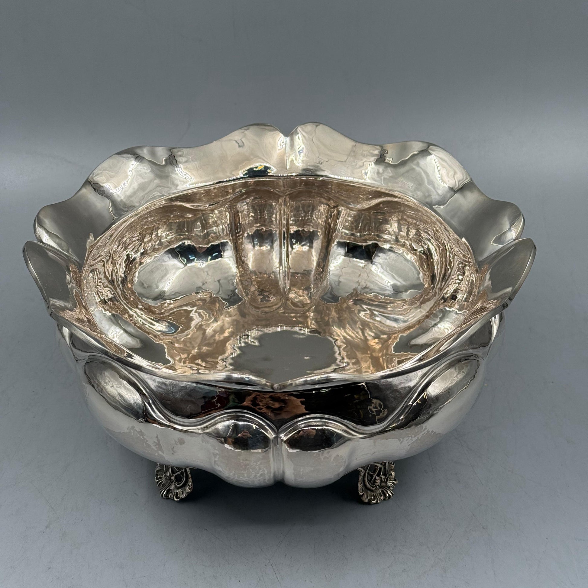 Close up of hand hammered martelé texture on deep silver bowl by PNR Decor ship from USA
