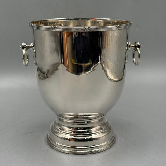 Elegant silver wine cooler bucket with ring handles and classic pedestal base
