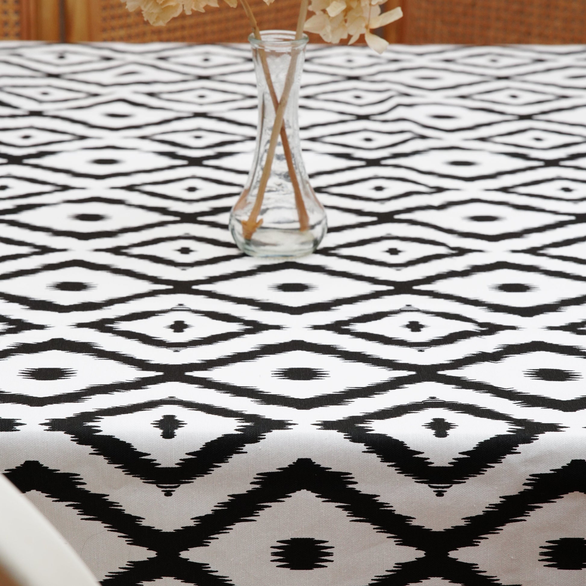 Elevate any tablescape with a made-to-order black & white rectangle tablecloth in an eco-friendly cotton blend—water repellent, wrinkle resistant, easy care, and event-ready. Fast USA shipping.