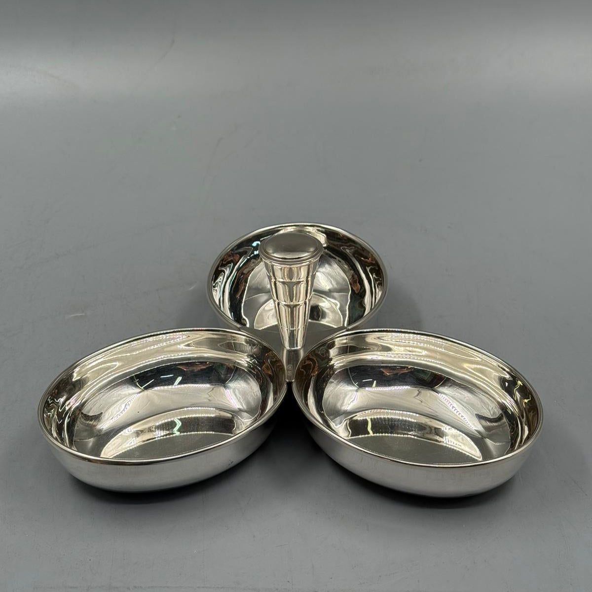 Triple bowl silver serving dish with center handle, perfect for nuts, snacks, and sweets