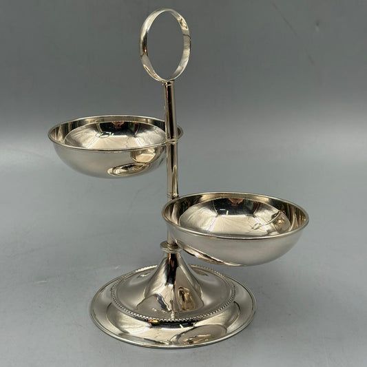Elegant two tier silver serving dish with handle, perfect for nuts, candies, and desserts