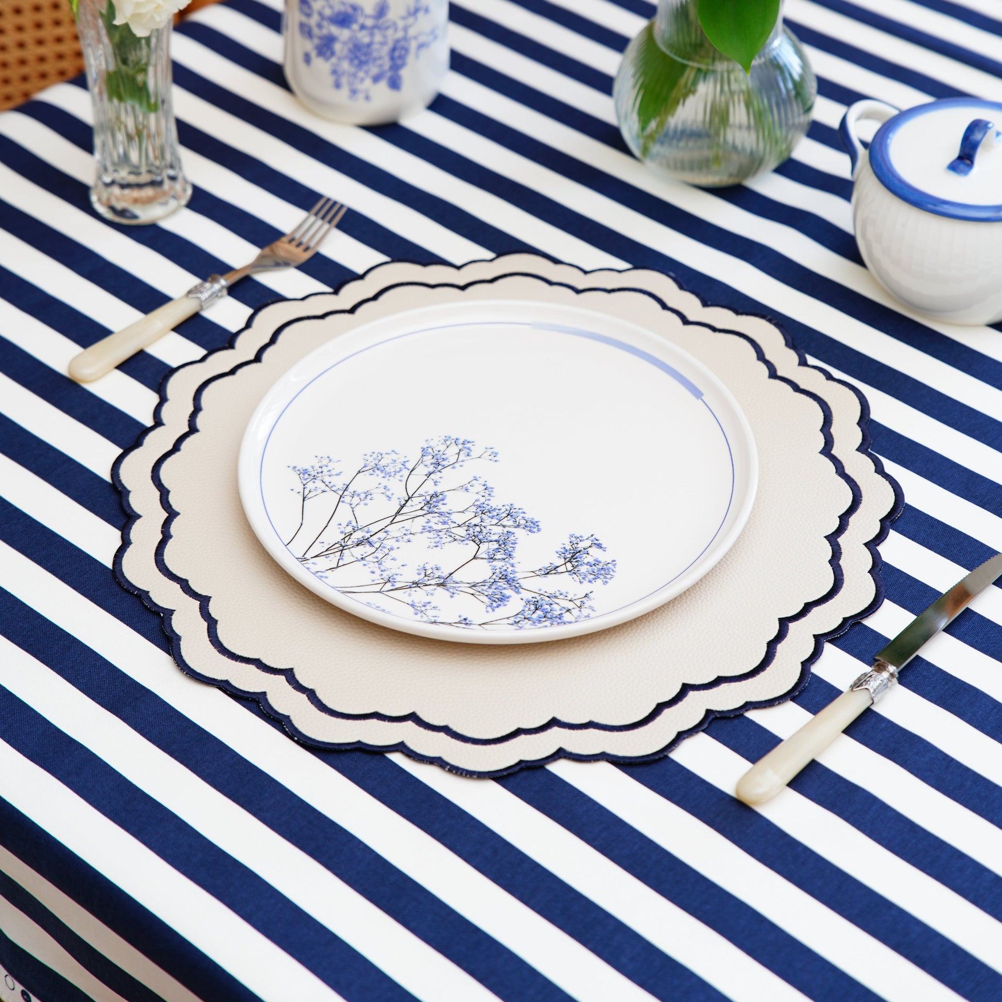 Elevate your tablescape with a made-to-order blue & white rectangle tablecloth in an organic cotton-poly mix—water repellent, stain resistant, easy care, ships fast across the USA.