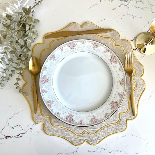 Vista Cream Wavy Edge Faux Leather Placemat  – expertly handcrafted from eco-friendly, vegan faux leather with elegant embroidery and double-layered design, stain-resistant and durable. Exclusively by PNR Decor.