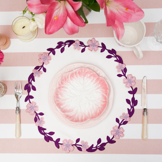 Unity Round Placemat in White & Purple – Combining handcrafted detail with vegan materials, this piece delivers sophistication with its dual-tone embroidered surface and elegant silhouette.