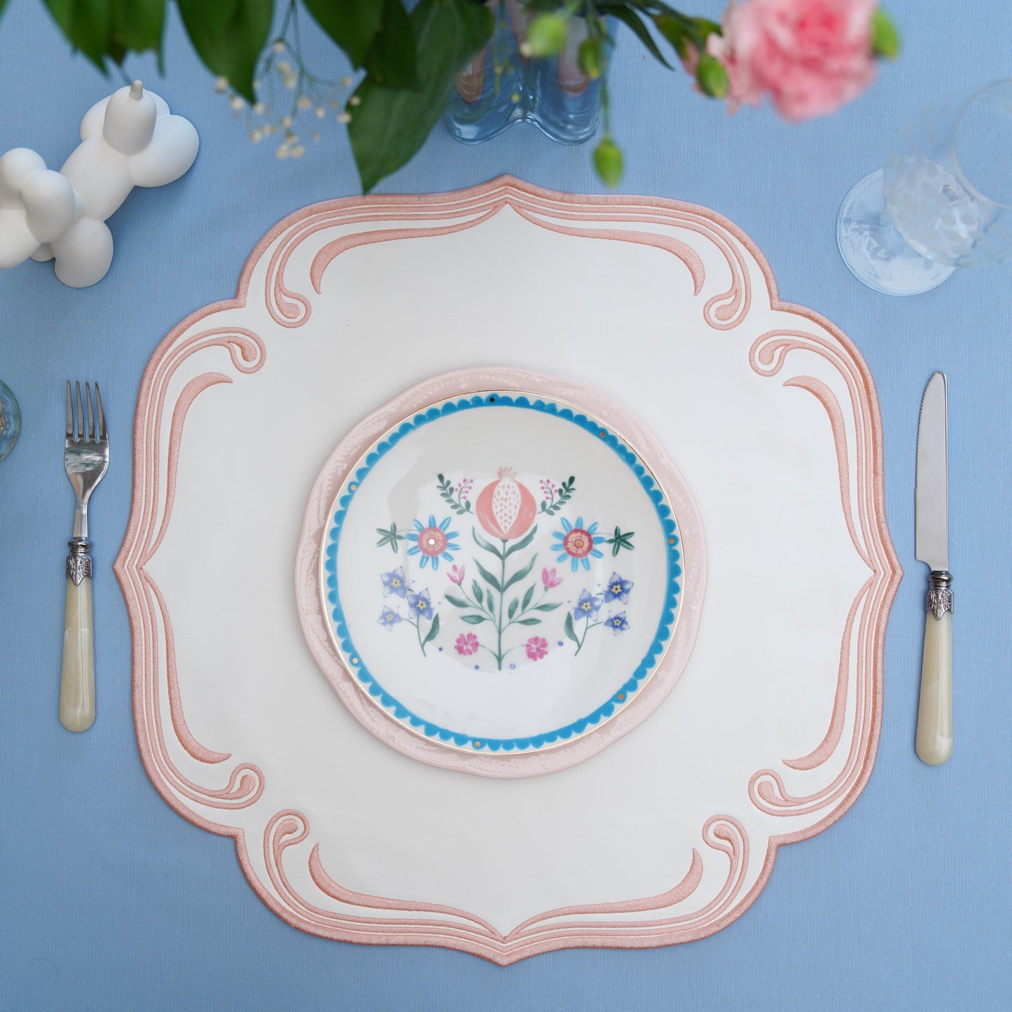 Faux leather table mat shown in a clean and contemporary square layout