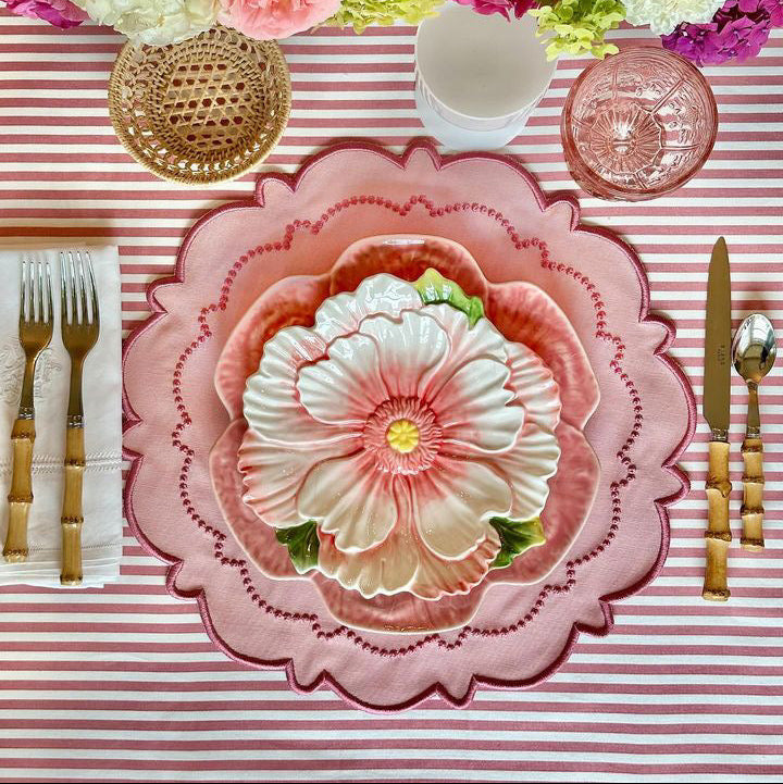 Harmony scalloped cotton placemat displayed on a formal dining table