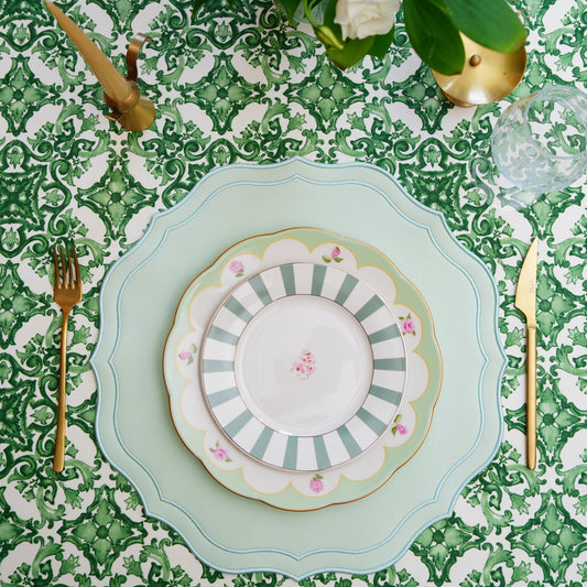 Square-shaped vegan leather placemat from the Orchid collection arranged on a formal table