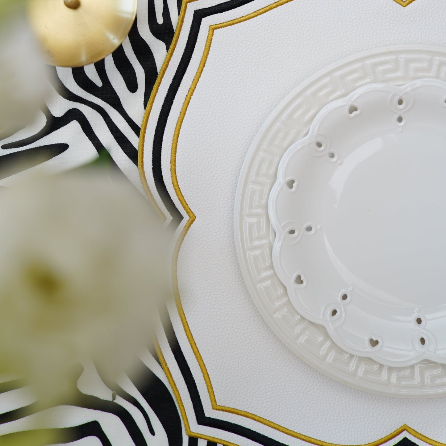 Stylish and sophisticated, this square placemat offers premium detailing, vegan leather material, and functional charm.
